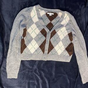 Gray button up argyle cardigan sweater.